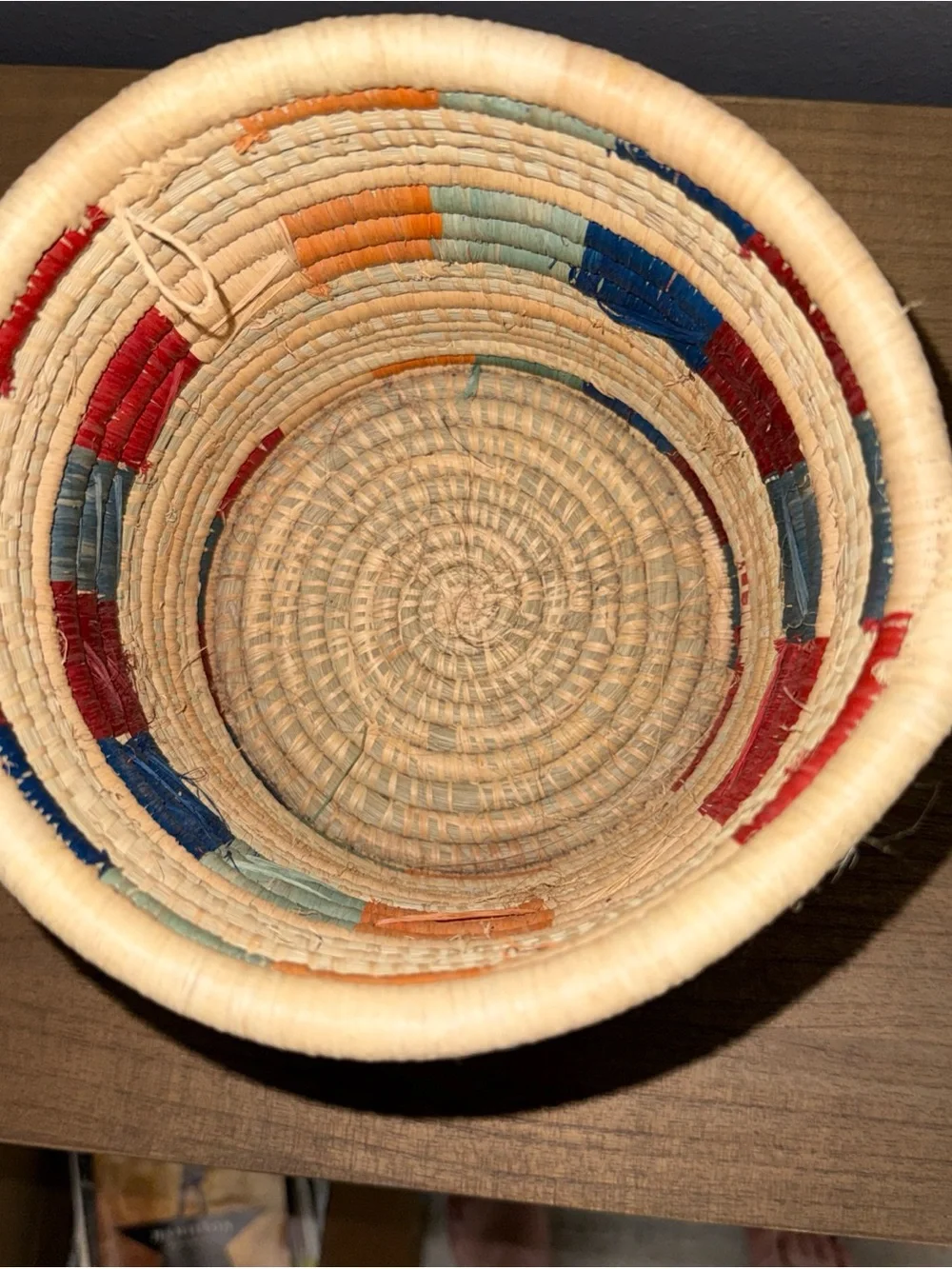 Handwoven Natural Basket with Red and Blue Accents